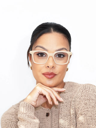 Marina wearing EyeCandys Hotshot Square prescription glasses – classic square frames with blue light blocking lenses, Zeiss HMC anti-glare coating, UV-responsive photochromic transitions, and polarized sunglasses option. Best square eyeglasses for eye strain, work, and everyday style.