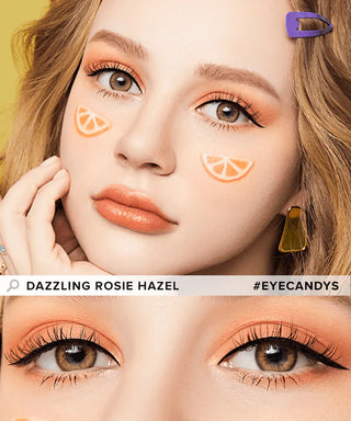 A young woman with hazel eyes, peach makeup, orange slice cheek art, purple hair clip, and yellow earrings wears Olola Dazzling 1-Day Rosie Hazel (10pk) color contacts. Text: “Dazzling Rosie Hazel” and “#EYECANDYS.” Brand: Olola.