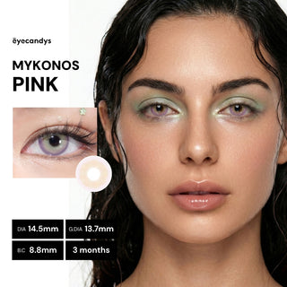 Model wearing EyeCandys Pink Label Mykonos Pink colored contact lenses with muted lavender-pink gradient and soft beige center for a glassy eye effect