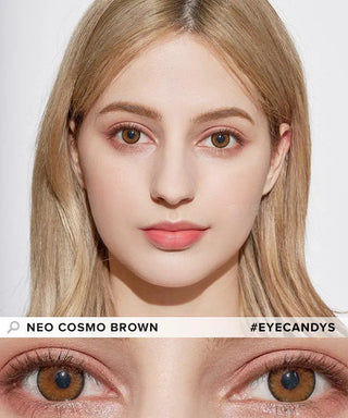 A woman with light skin and blonde hair faces forward, wearing NEO Vision Cosmo Brown lenses by NEO Vision. A close-up shows her brown eyes with the contacts. Text reads “NEO VISION COSMO BROWN” and “#EYECANDYS.”.