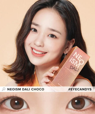 A smiling woman with shoulder-length hair holds a box labeled "NEO Vision Neoism Dali Choco 1-Day (50pk)." Her brown eyes, brightened by NEO Vision daily lenses, shine in the close-up. Text: "NEOISM DALI CHOCO" and "#EYECANDYS.