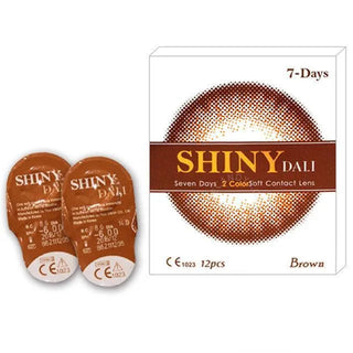 A box labeled "NEO Vision Weekly Shiny Dali Brown (12pk)" with brown packaging, containing 12 weekly disposable brown circle lenses from NEO Vision.