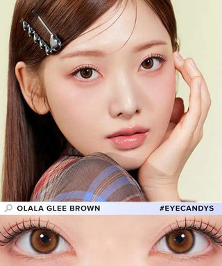 A woman with fair skin and straight brown hair wears Olola Glee Brown by Olola. A close-up shows how natural these colored contacts look, making them ideal for dark eyes. Text reads: "OLALA GLEE BROWN #EYECANDYS.