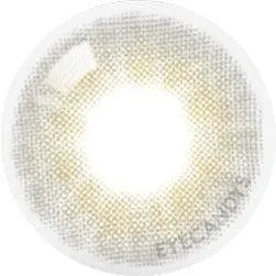 The Olola Able Grey by Olola is a single grey contact lens with a light beige and gray pattern, a translucent pupil center, and subtle gradient edges. “Olola” branding is faintly visible. Ideal for dark eyes.