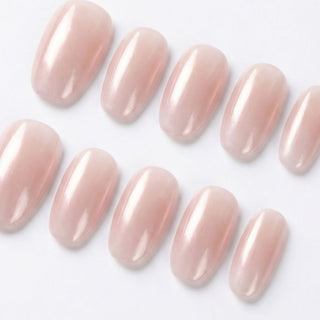 Seraphina press on nails by EyeCandys featuring soft blush pink cat eye nails with pearlescent shimmer overlay in a clean girl aesthetic short oval set.