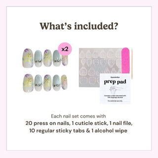 Reusable press on nails kit by EyeCandys including 20 nails, nail file, cuticle stick, alcohol wipe, and 10 sticky tabs for secure application.