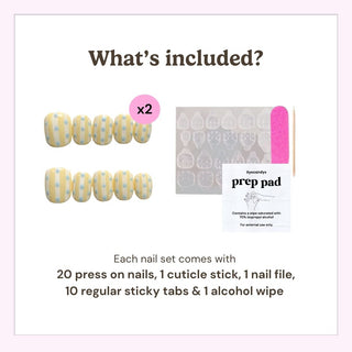 Reusable press on nails kit by EyeCandys including 20 nails, nail file, cuticle stick, alcohol wipe, and 10 sticky tabs for secure application.