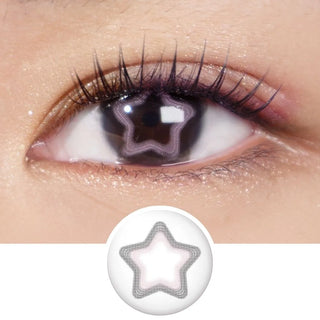 A close-up of an eye wearing EyeCandys Pink Star contact lens, showing a bold black star design on the iris. Below is a separate image of the lens from EyeCandys’ pastel color contacts collection, featuring the same striking star pattern.