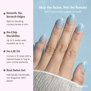 Stylish hand wearing EyeCandys Plot Twist press on nails featuring two contrasting designs: jelly blue confetti nails and retro polka dot nails.