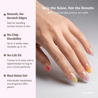 Stylish hand wearing Sorbet Season press on nails featuring bright summer ombre nails and fun dot confetti accents.
