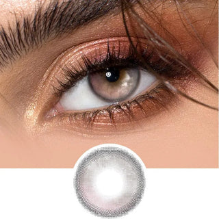 Close-up of an eye with shimmery brown and gold eyeshadow, enhanced by grey EyeCandys contact lenses from the Peach Fuzz Bundle (5 Pairs). Below, a zoomed image highlights the non-prescription lens design.