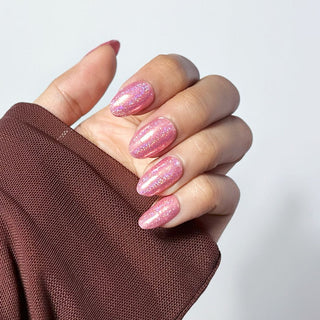 Hand wearing EyeCandys Supernova Gel Nail Stickers – glossy, long-lasting, and easy-to-apply nail wraps for a salon-quality manicure