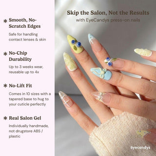 A hand with long, pastel Sweet n Tart Press-On Nails by EyeCandys featuring 3D art holds another hand with sheer, white-accented nails—skip the salon and enjoy an Insta-ready mani at home.