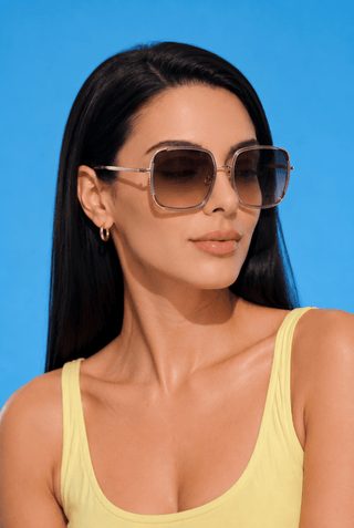 EyeCandys Amalfi Oversized Square sunglasses model shot featuring oversized square sunglasses with UV protection, trendy women's fashion eyewear, designer-inspired shades for everyday wear, summer outfits, vacation, street style, luxury fashion, and modern chic looks.