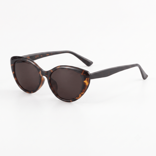 EyeCandys Bardot Cat Eye Tortoiseshell sunglasses model shot featuring classic tortoiseshell cat-eye sunglasses with UV protection, trendy women's fashion eyewear, designer-inspired shades for everyday wear, summer outfits, vacation, street style, and timeless luxury fashion.