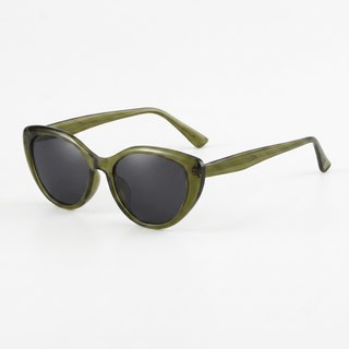 The Bardot Cat Eye by EyeCandys features olive green glossy frames with dark lenses and slightly curved arms. These vintage glam glasses offer a stylish, lightweight eyewear choice, shown here on a white background.