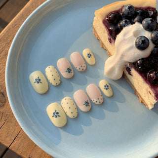 Reusable Blueberry Tart press on nails by EyeCandys featuring soft pastel base, blueberry fruit nail art, leaf details, and polka dot accents.