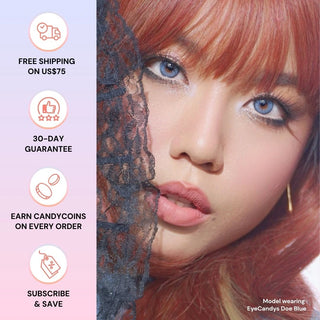 A woman with red hair wears EyeCandys Doe Blue contacts with a natural iris design, partially covered by black lace. Icons and text beside her highlight: free shipping $75+, 30-day guarantee, CandyCoins rewards, and subscribe & save.
