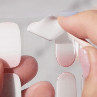 Easy application of EyeCandys Gel Nail Stickers for a flawless gel manicure, perfect DIY nail art, and long-lasting nail designs at home