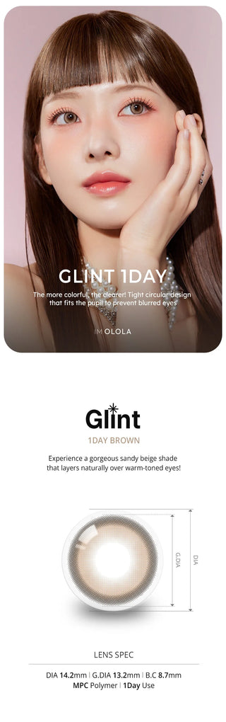A woman with straight, light brown hair and bangs touches her face, wearing natural makeup and Olola Glint 1-Day Brown (10pk) daily lenses. Below, a diagram shows the lens design, specs, and descriptions. Brand: Olola.