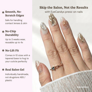 Stylish hand wearing EyeCandys Hanami press on nails featuring embossed floral nails, rose gold centrepiece, and silver detailing.