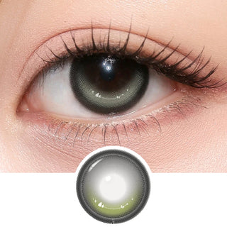Close-up of eye with long lashes wearing i-Girl One Pick Dear One Grey contact lenses from EyeCandys, showcasing natural grey color and detailed lens design pattern underneath