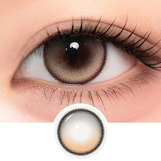 Close-up of a model's eye with long lashes wearing i-Sha One Pick Only One Dusty Brown prescription colored contact lenses, with the lens design displayed below. Available at EyeCandys.