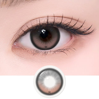 A close-up shows a human eye wearing i-Sha Reborn Red 1-Day Rosy Cream (10pk) contacts by i-Sha, featuring a large gray lens with a dark outer ring and subtle ribbon-lace pattern. Below is the lens design on a white background.