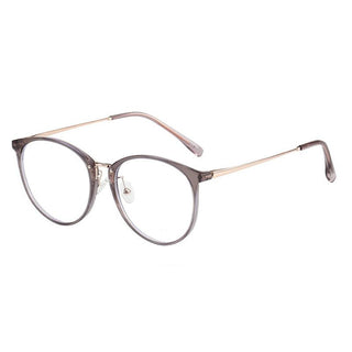 Infinity Oversized Oval by EyeCandys features vintage-inspired, round transparent gray frames with thin gold metal arms. These wide-fit eyeglasses have clear lenses and adjustable nose pads for comfort.
