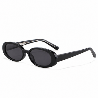 Eyecandys Jellicle Black sunglasses featuring a sleek oval full-frame design, minimalist 90s-inspired style, and a medium unisex fit.