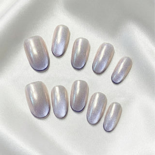 EyeCandys Lavendroid press on nails featuring silvery chrome cat eye nails with cobalt violet gradient and aurora shimmer finish.