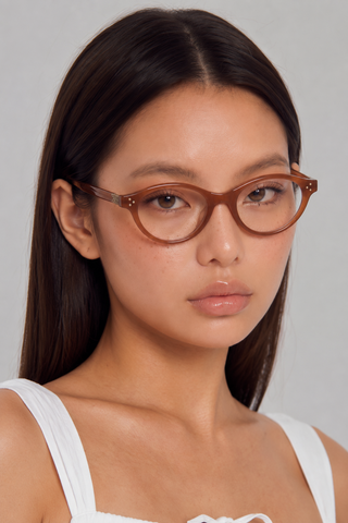 EyeCandys Loretta prescription reading glasses model shot featuring elegant designer-inspired optical frames for prescription and reading lenses, stylish women's eyewear for everyday wear, office, blue light protection, minimalist fashion, and modern luxury looks.