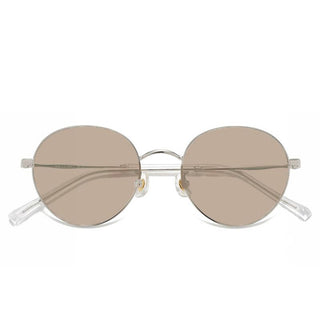 The EyeCandys Luna Round features light brown tinted lenses and thin, transparent rims for a vintage-inspired titanium look, elegantly showcased against a white background.