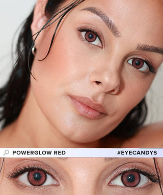 A woman with wet hair and natural makeup gazes at the camera, wearing EyeCandys Powerglow Reddish Pink color contacts. A close-up highlights her vibrant eyes. Text reads "EyeCandys Powerglow Reddish Pink #EYECANDYS".