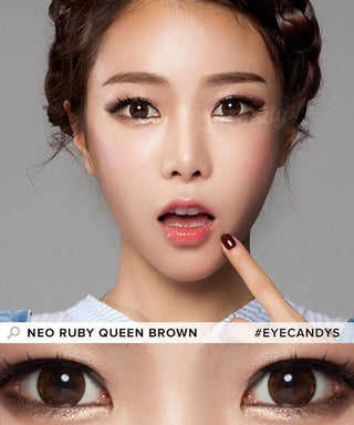 A woman with braided hair and flawless makeup holds a finger to her lips in surprise. Below, her big brown eyes shine with NEO Vision Ruby Queen Brown (Custom Toric for Astigmatism) lenses. Text: "NEO VISION" and "#EYECANDYS".