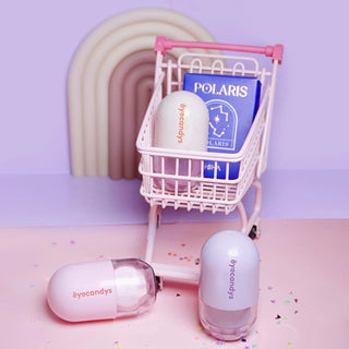 EyeCandys Pill-Shaped Contact Lens Case Kit inside a shopping cart, featuring a compact and stylish design for lens storage. Ideal for contact lens care, lens case kit, and convenient contact lens accessories