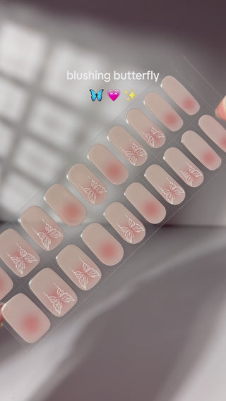  Video demonstrating the application of EyeCandys Flutter Gel Nail Stickers. Watch how to achieve effortless, long-lasting spring nails with a delicate fluttering design. The 7-free, allergy-friendly formula cures in sunlight, lasting 2-3 weeks without the need for a UV lamp.