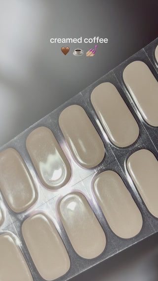 Video showing application of Eyecandys Moo-n Beam Gel Nail Sticker in creamed coffee color – easy 10-minute manicure, neutral minimalist design, long-lasting 2-3 weeks, 7-free allergy-friendly formula.