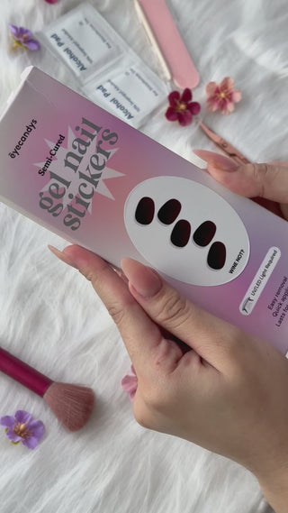ASMR application of EyeCandys 'Wine Me Not' gel nail sticker, showcasing easy, relaxing application with vibrant, long-lasting color. Perfect for at-home manicures with a glossy, salon-quality finish and effortless wear.