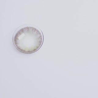 Video demonstration of a person applying coloured contact lenses, showcasing the transformation and enhancement of eye color with EyeCandys color contact lenses. Discover the ease and impact of wearing color contacts for a striking, natural look.