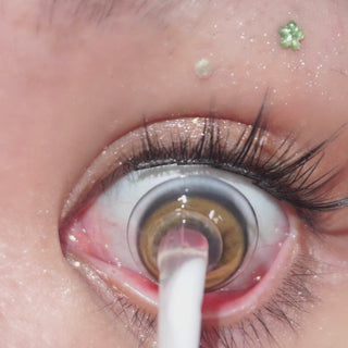 Close-up video of blinking eye with long lashes wearing EyeCandys Pink Label Barcelona Brown – natural-looking prescription colored contact lenses. Soft, comfortable color contact lenses that enhance brown eyes.