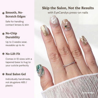 Close up hand showcasing EyeCandys Shell We press on nails with mother of pearl texture, pearl beads, and shell inspired design.