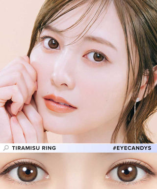 A young woman with light skin and brown hair poses with her hand near her face. Below, a close-up highlights her brown eyes wearing Feliamo 1-Day Tiramisu Ring (10pk) by Feliamo. Text reads "TIRAMISU RING" and "#EYECANDYS".