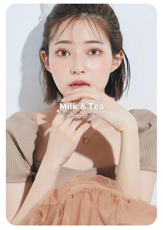 Asian model demonstrating a K-idol-inspired look with Chuu Milk & Tea Cream Brown coloured contact lenses, highlighting the instant brightening and enlarging effect of the circle contact lenses over dark irises.